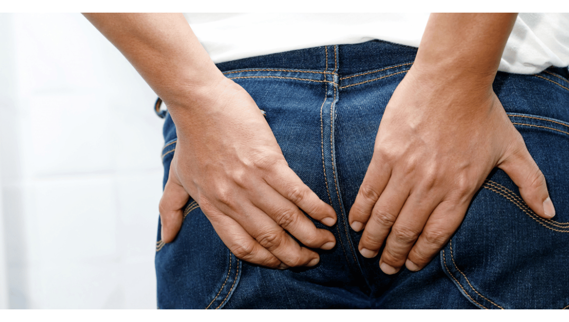 What causes a perineal tear in men?